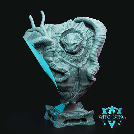 A bust of a forest like guardian. The head and chest look like tree bark with vines attached. It stands around 100mm on its base and is printed in abs like resin.